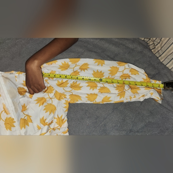 A yellow dress with leaves!!! DRESS IS NOT TRUE TO SIZE MORE LIKE A TEN - Picture 12 of 12